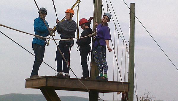 Taylor Gaydon (R), 15, ziplines with friends at the Diabetic Youth Foundation's diabetes camp in Livermore, a place where kids can have fun while learning to manage their disease.