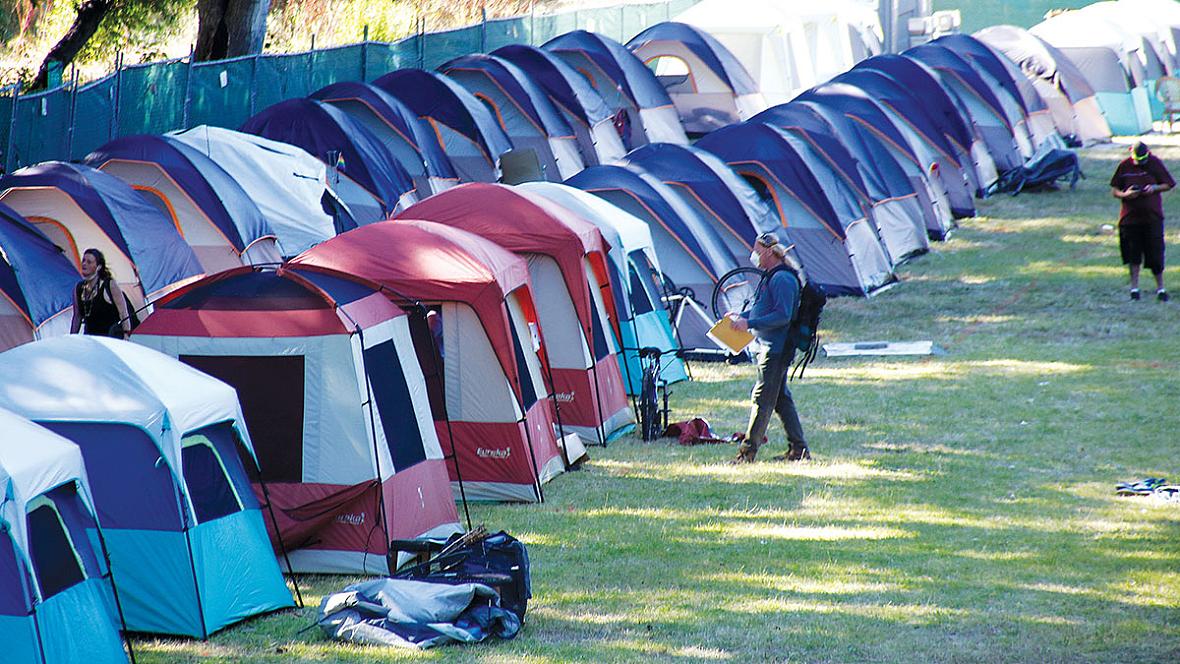  THE CITY AND COUNTY OF SANTA CRUZ HAVE PARTNERED IN A NEW MANAGED ENCAMPMENT IN SAN LORENZO PARK.