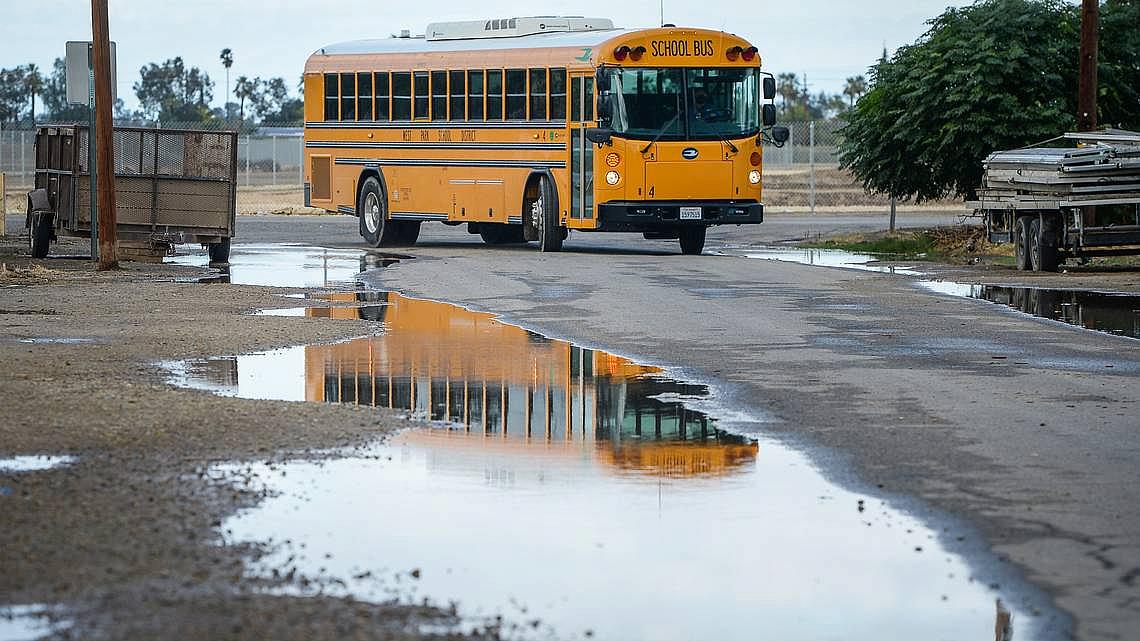 A West Park School District school bus turns onto South Prospect Avenue from West Church Avenue south west of Fresno on Monday, 