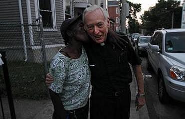 Anette Haynes gave Conway a kiss on Richfield Street while he walked the neighborhood on a Friday night in August.