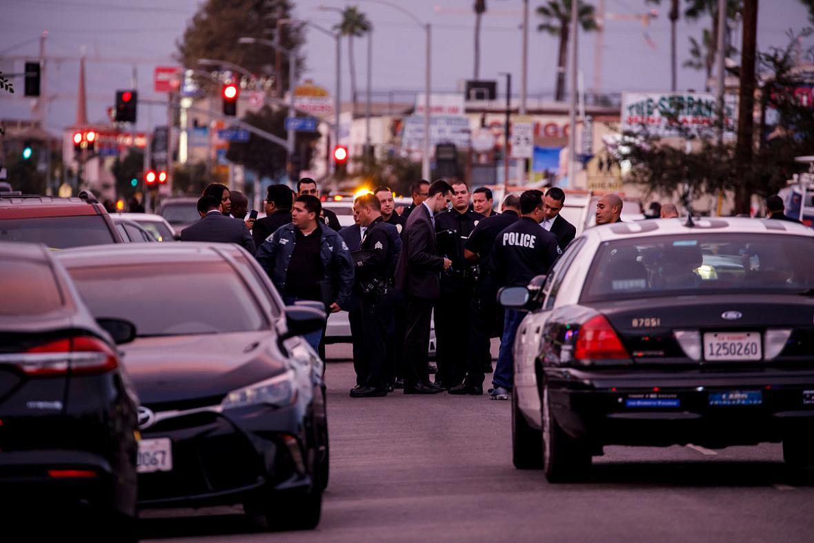 Police respond to a crime scene near Hawkins High School. (Marcus Yam / Los Angeles Times)