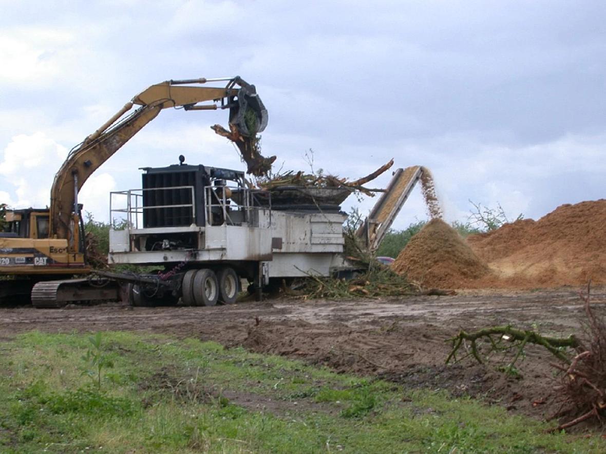 Regulators promote chipping or grinding agricultural debris like branches and whole trees using heavy equipment as the primary a