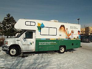 The Colorado health exchange van stops at a shopping center in Fort Collins. Photo Credit: Eric Whitney