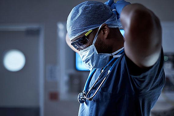 Medical Worker Wears a Mask for Protection