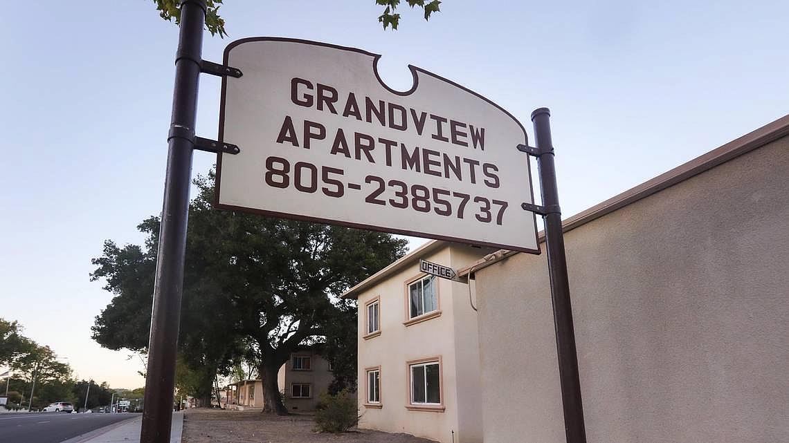 The sign that used to mark the entrance to Grand View Apartments, where hundreds of renters lived with poor conditions for years