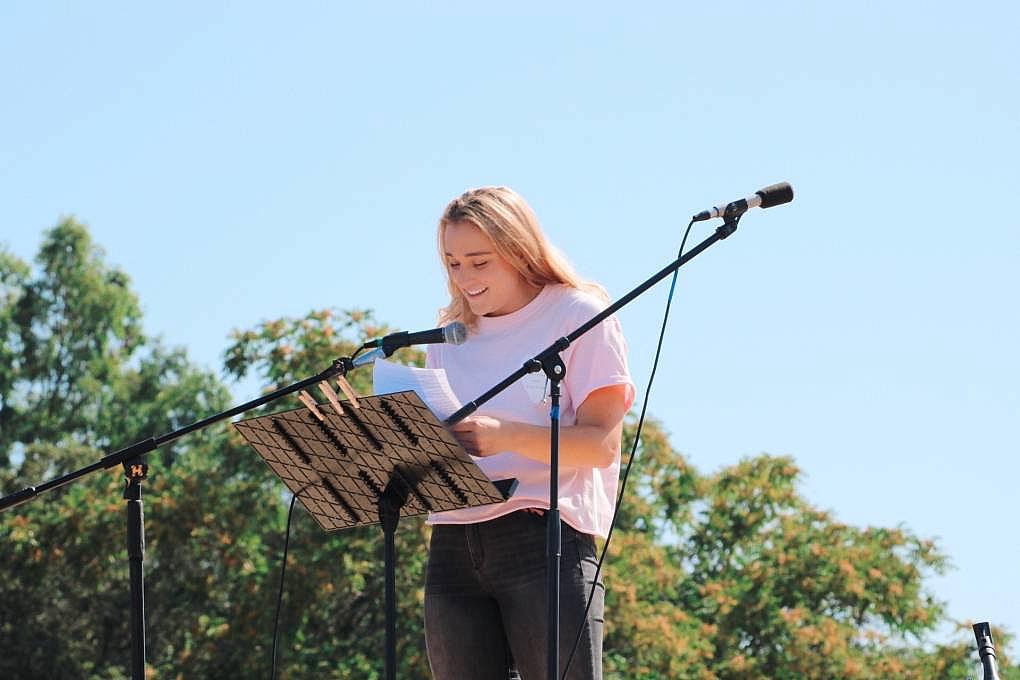 Abbi Berry, who graduated from Los Gatos High School in 2018, speaks during a rally over sexual abuse on campus. 