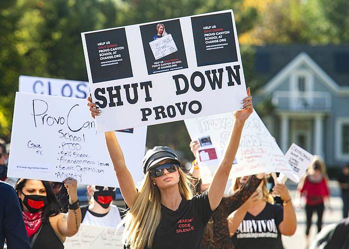 Paris Hilton leads a march to the Provo Canyon School, during a rally calling for the closure of Provo Canyon School, a resident