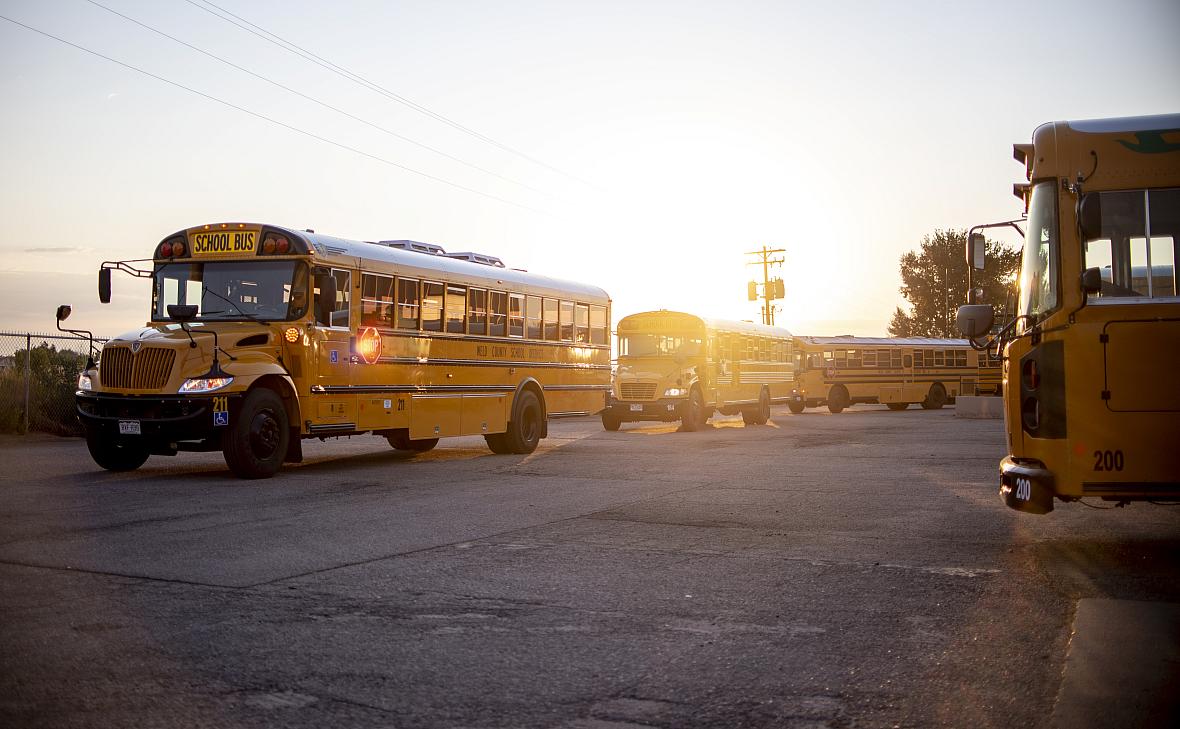 Buses head out on their morning routes at the Greeley-Evans School District 6 Fleet Maintenance Center in Greeley Aug. 19, 2020.