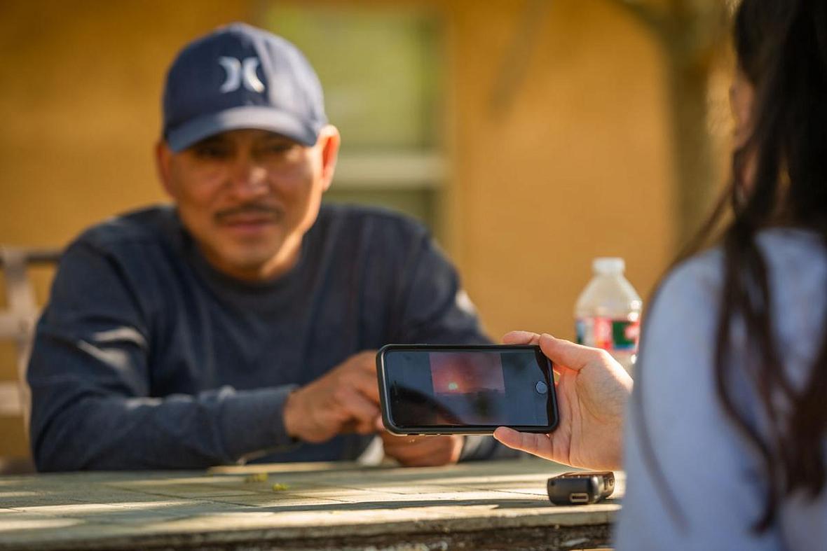 Photos of the Glass Fire on Vicente Villalvazo's phone, center Villalvazo spent nine days with four other men sleeping out of his car amid the fires. Photos of the Glass Fire on Vicente Villalvazo's phone.