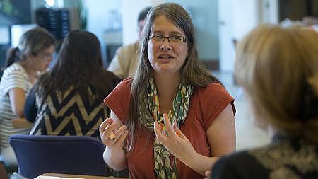 Dr. Abby Letcher, medical director of the Neighborhood Health Centers of the Lehigh Valley, participates in health and wellness discussion with team members and patients in the Lehigh Valley Super Utilizer Partnership.