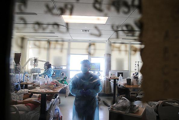 Clinicians care for Covid-19 patients in a makeshift ICU at Harbor-UCLA Medical Center on January 21, 2021 in Torrance, Californ