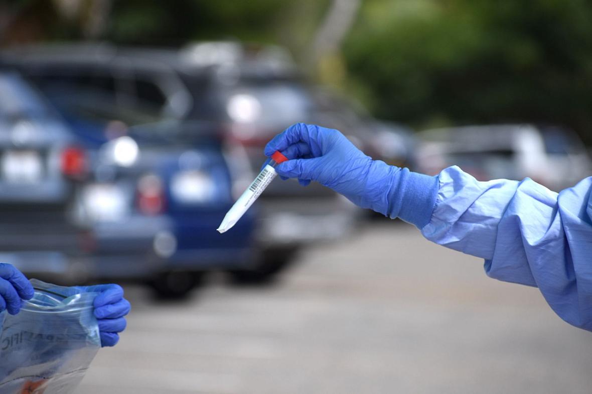Novel coronavirus testing has been a critical part of outbreak prevention efforts throughout Santa Barbara County. Frequent testing at skilled nursing homes was used to find positive cases among residents and workers. Here, Sansum Clinic workers at a drive-thru testing site package a testing swab to be sent to a laboratory on Aug. 4, 2020. Novel coronavirus testing has been a critical part of outbreak prevention efforts throughout Santa Barbara County.