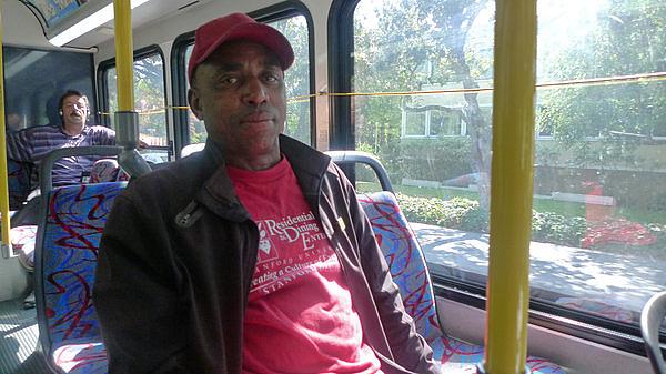 Leaburn Alexander works two jobs and does not have health insurance. It takes him three hours to commute home from the job he works as an overnight hotel janitor. Lisa Morehouse/KQED