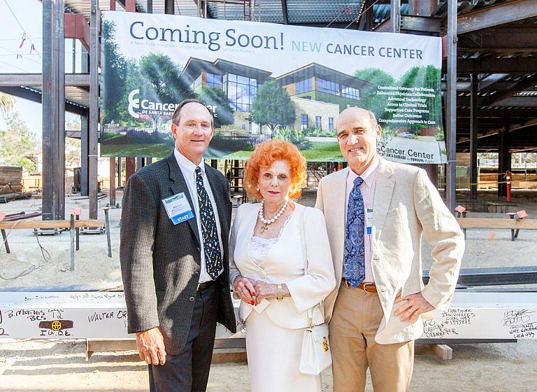 Rick Scott, left, president of the Cancer Foundation of Santa Barbara, philanthropist Lady Leslie Ridley-Tree, and Dr. Kurt Ransohoff, CEO and chief medical officer of Sansum Clinic, at a beam signing ceremony Aug. 19 for the Cancer Center of Santa Barbara. A merged Cottage-Sansum could attract more philanthropy for specialty care. Cancer Foundation of Santa Barbara