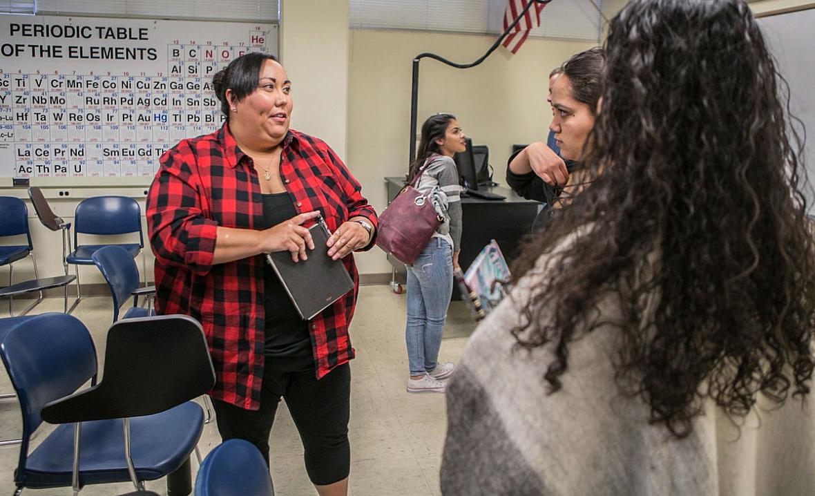 After losing her campus job in February 2017, Jessala Grijalva went hunting for work and had trouble getting help with child care, resorting at times to leaving her three children home alone. Above, she’s shown at a University of Arizona class that helps students apply for advanced degrees. Grijalva earned a bachelor’s degree in government and public service at the UA. Photos by Ron Medvescek / Arizona Daily Star