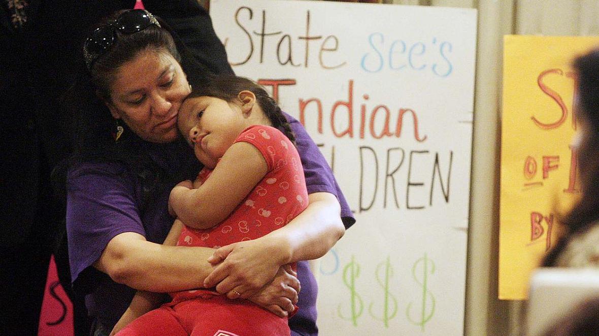 Madonna Pappan and her child in 2013. Pappan was is one of three Sioux mothers who sued South Dakota over its alleged violation 