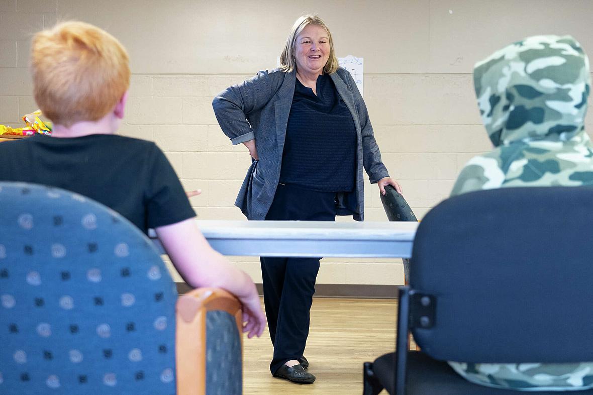 Sanger ISD's director of student intervention, Ann Hughes, works with students in a social skills class at the Linda Tutt Learning Center, Tuesday, March 8, 2022, in Sanger. Sanger Independent School District has taken a holistic approach, beefing up its own resources and partnering with the community, creating one of the best-resourced districts in Texas. Sanger ISD's director of student intervention, Ann Hughes, works with students in a social skills class at the Linda Tutt Learni