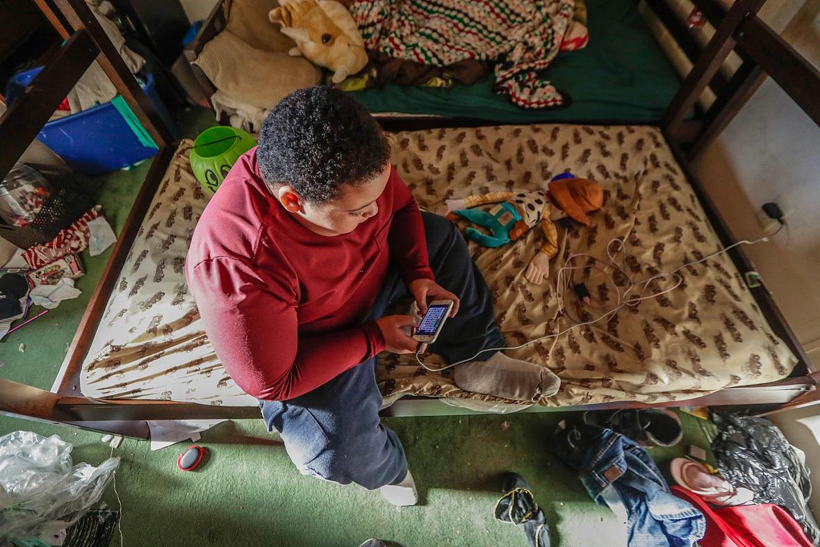 An afternoon inside the trailer of Michelle Kirkland, her husband Brandon Hughes and their two children Vivianna, 9, and Brandon