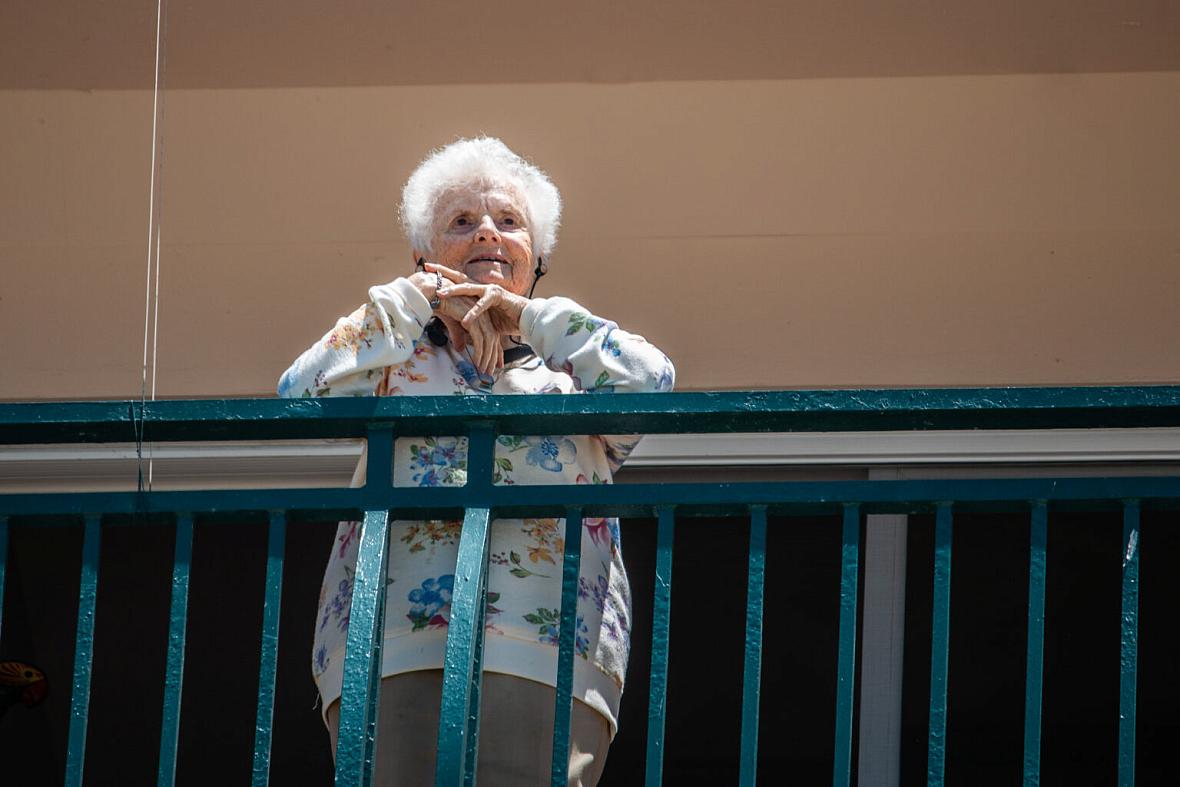 Natasha Josefowitz looks beyond her balcony at the White Sands Retirement Community in La Jolla