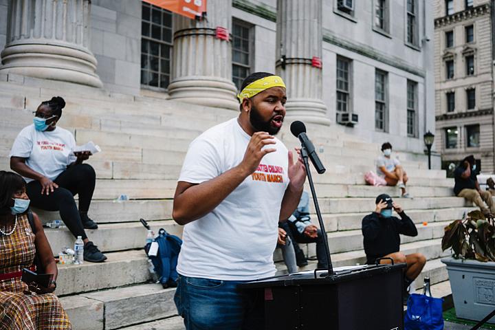 Larry Malcolm Smith Jr. spoke about his experience in the foster care system at a march for Black foster youth.