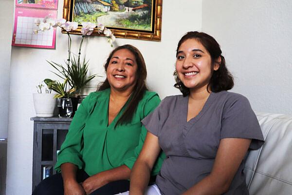 Ivonne Estela Ramos and her daughter Allison, pose for a portrait inside their studio in San Francisco's Bayview neighborhood. 