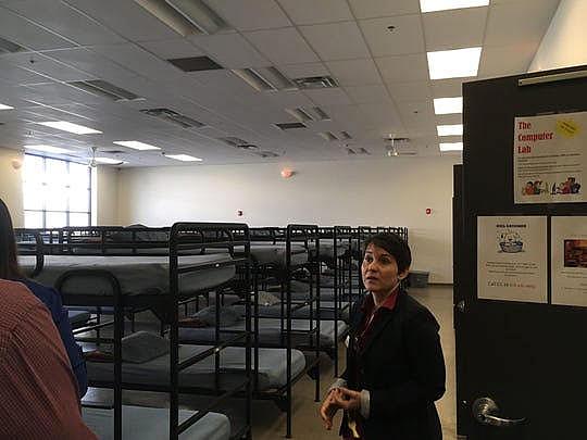 Amina Aun, shelter manager at Roy's Desert Resource Center, offers a tour of the shelter.