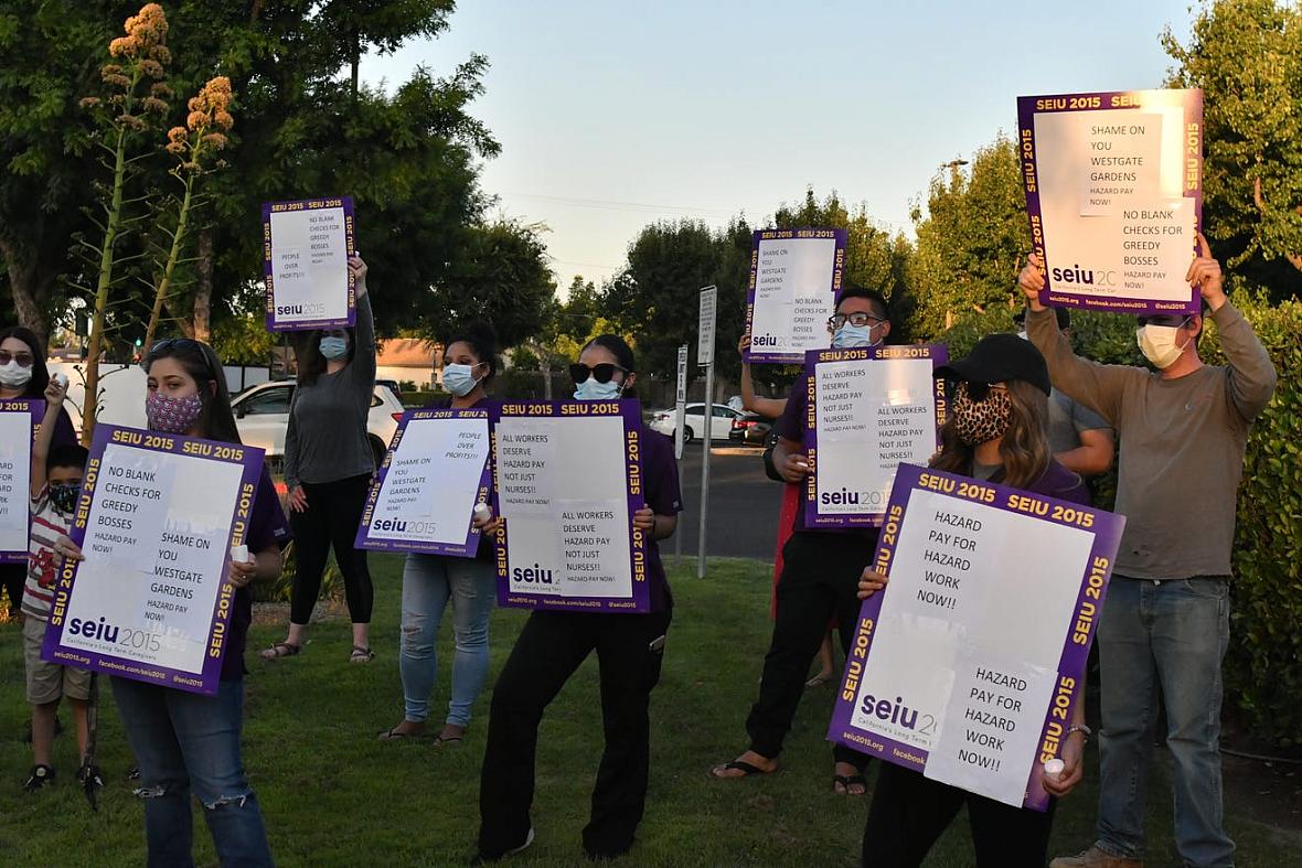 Westgate Gardens Care Center staff held a vigil at the nursing home, calling for boosted pay and better treatment during the coronavirus pandemic. Westgate Gardens Care Center staff held a vigil at the nursing home, calling for boosted pay and better treatment.