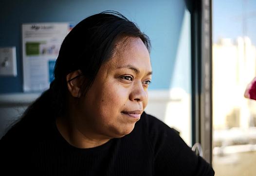 a woman staring out the window