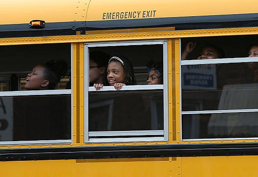 Students ride the bus in Baltimore, Maryland.