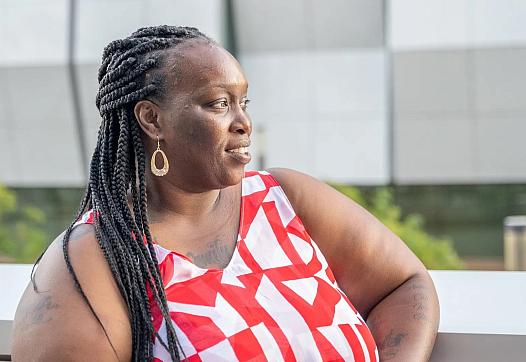 woman in a red and white blouse