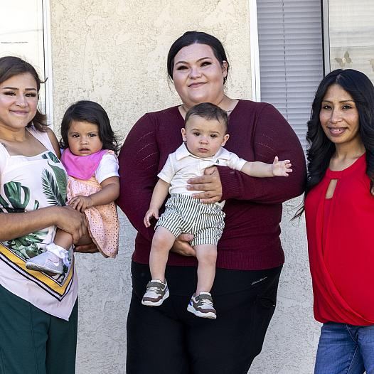 From left, Gladis, Mary and Nancy spoke to Fellows taking part in the 2026 National Fellowship during a field visit to the housing complex where they now live. 