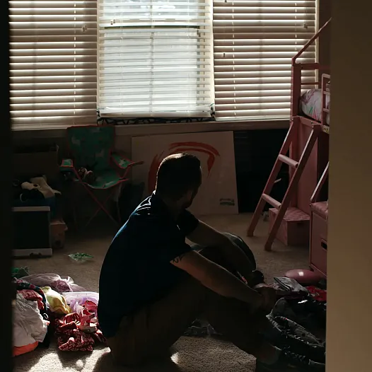 A men sitting in the room 