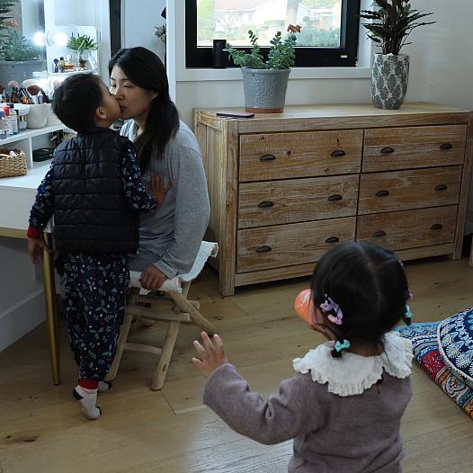 Comedian, actress and postpartum depression survivor Jiaoying Summers with her 4-year-old son and 2-year-old daughter in their home 