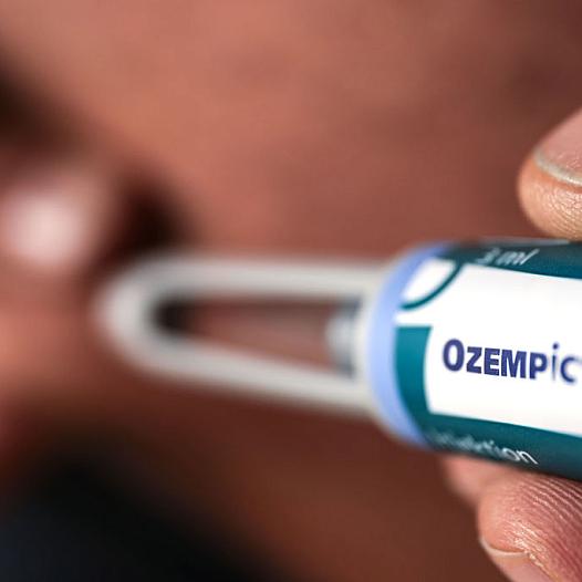 Ozempic shown being administered.