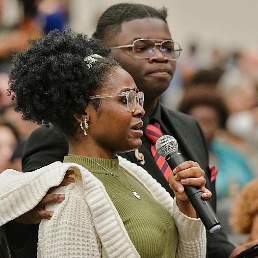 Students speak in opposition to a proposal by Elon Musk's xAI to run gas turbines at a new data center in Memphis, Tennessee, during a public comment meeting.