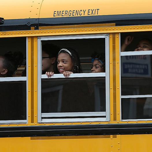 Students ride the bus in Baltimore, Maryland.