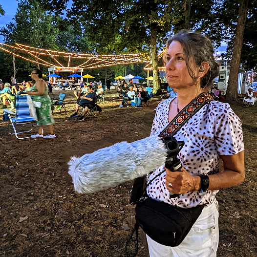 A woman with a mic