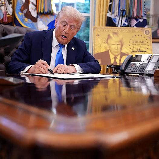 Person signing a document in office