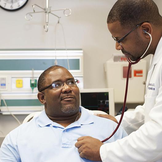 A doctor diagnosing patient 