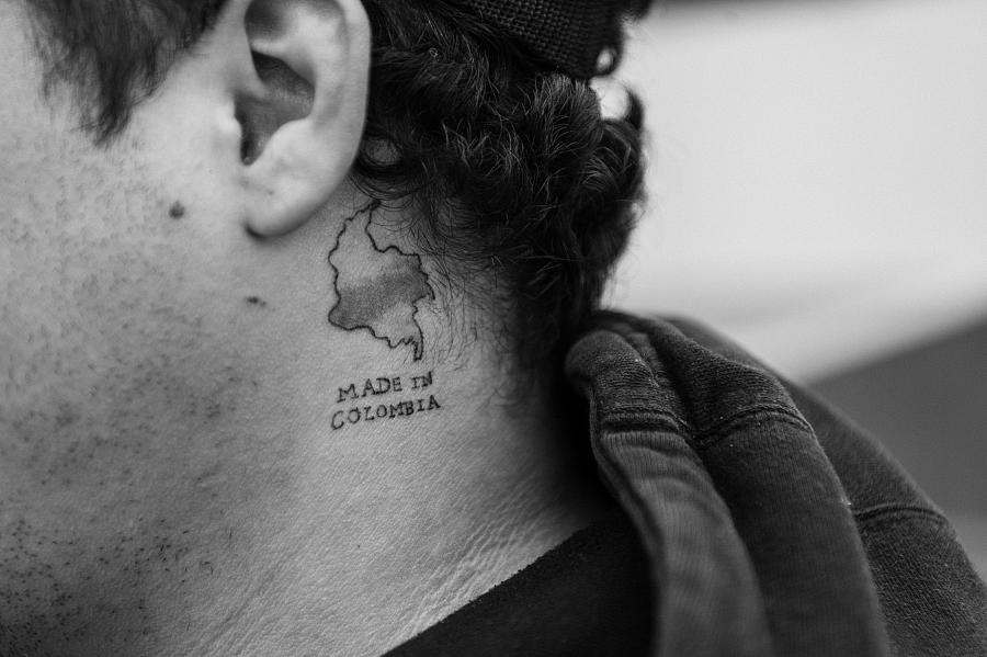 man's neck with a tattoo
