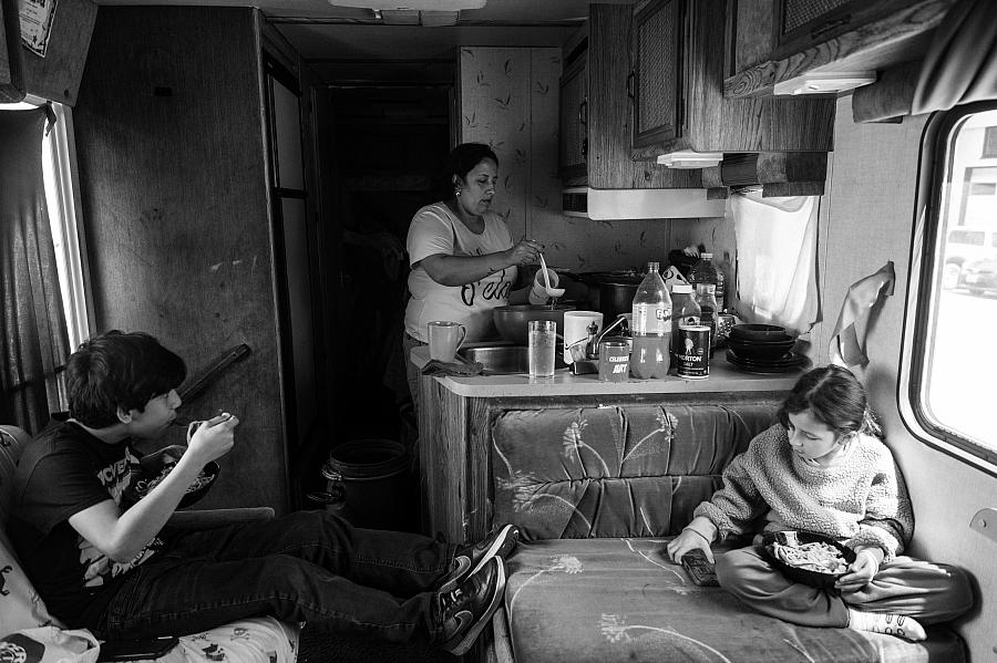 three people in a room