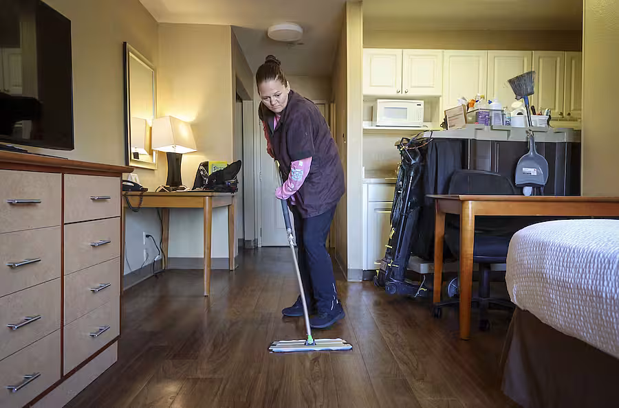 A women mopping the floor