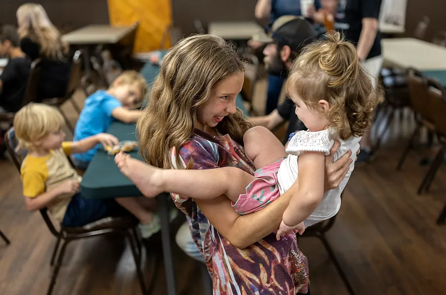 Ellianah Holtorf, 10, plays with her little sister Ember, 2