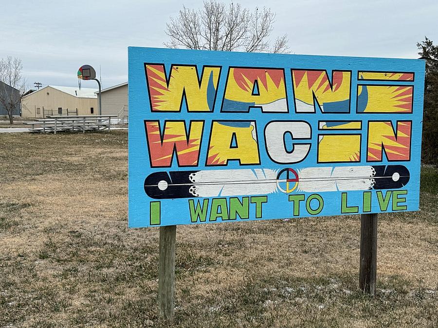 "I want to live" sign