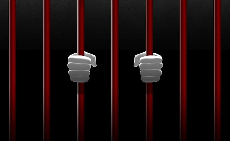 hands behind bars