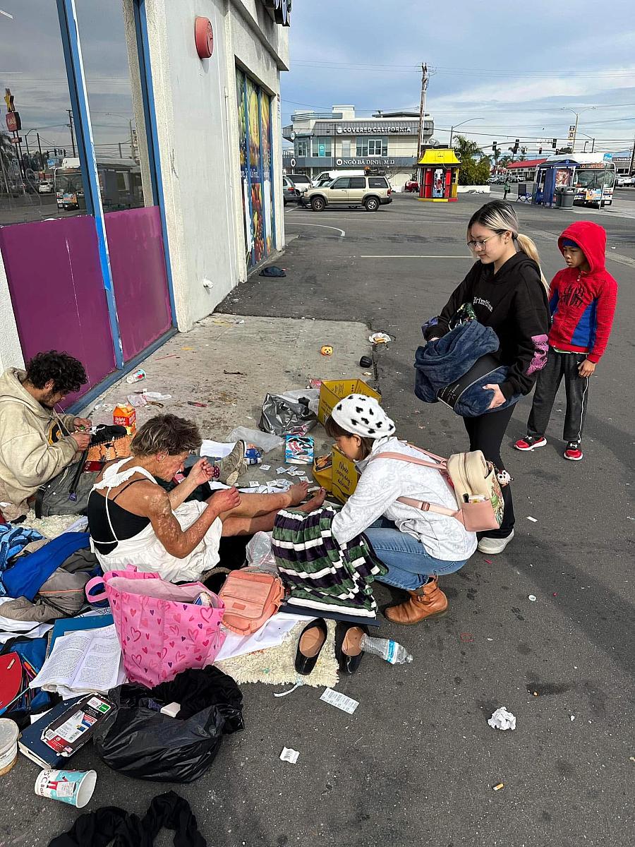 people sitting on the ground