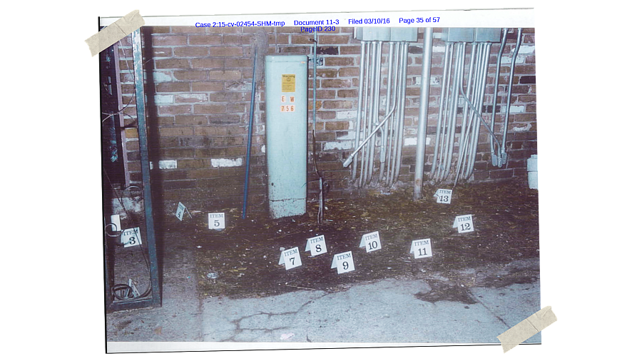 An image from Shawn Hatcher’s case files shows police evidence markers at Raintree Apartments 