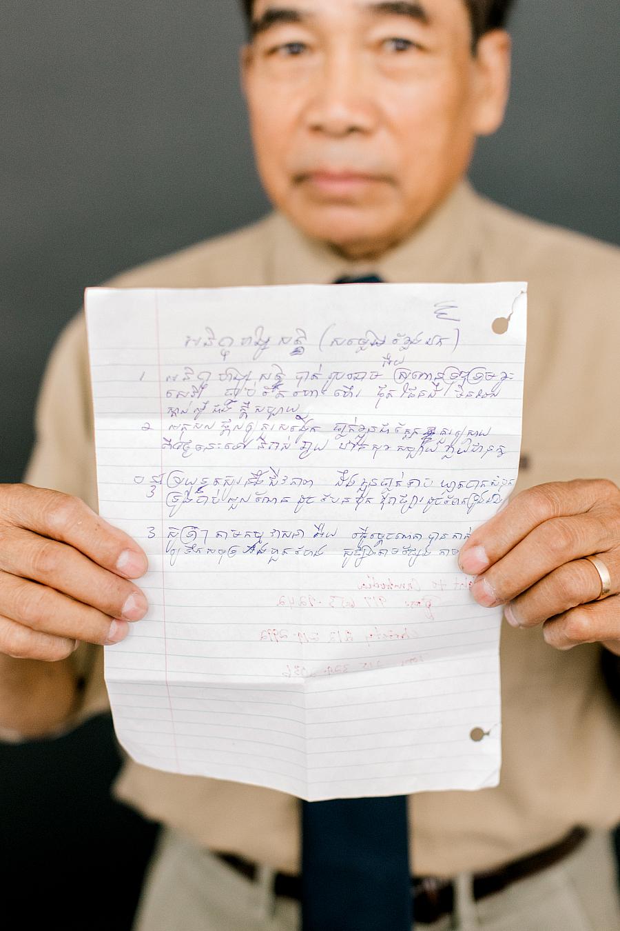 Person holding a piece of paper