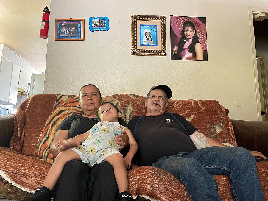 A man and a woman sitting on a couch