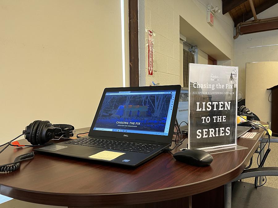Desk with laptop on top with recording devices